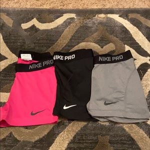 3 pairs of Nike Pros